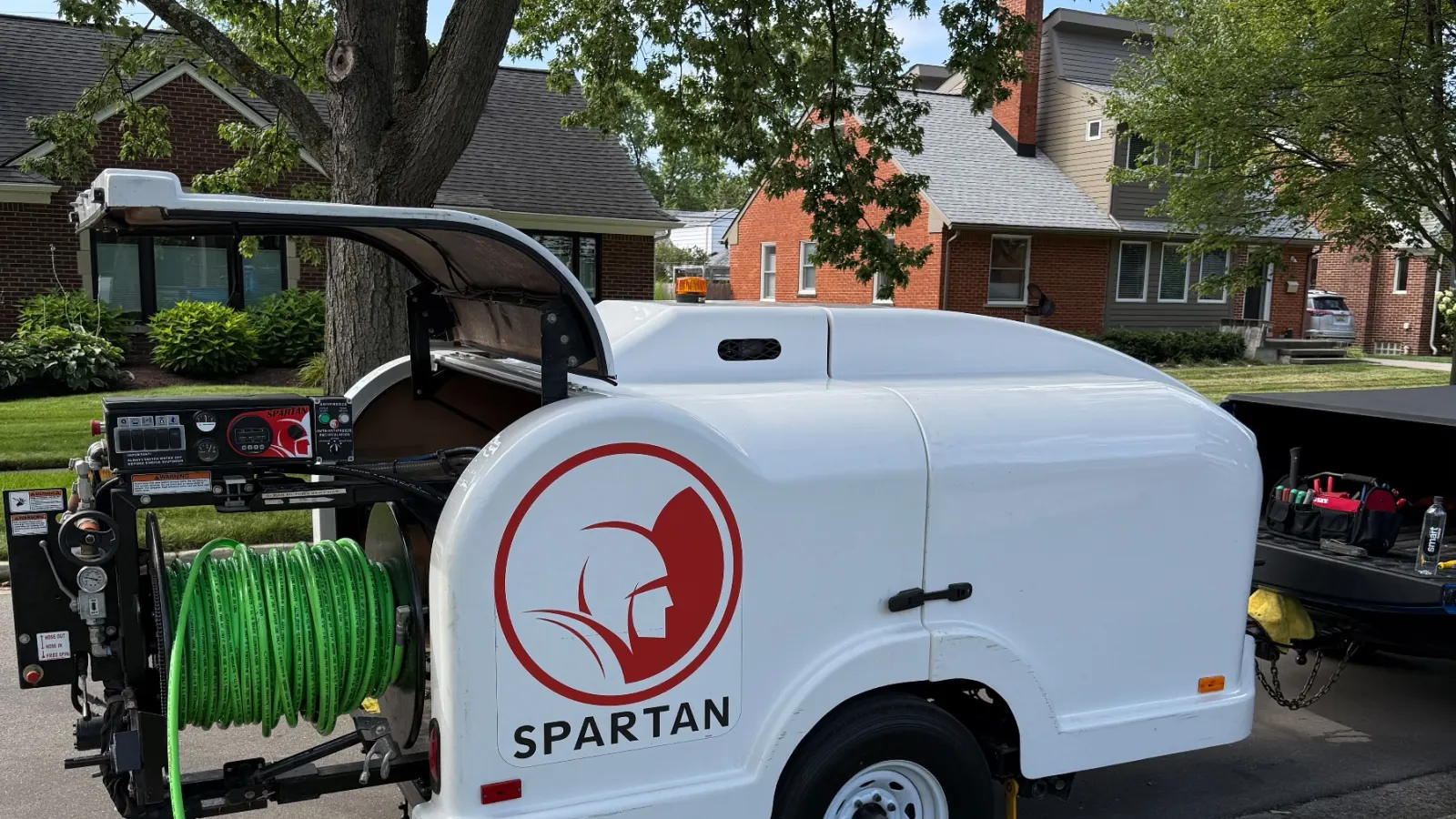 Hydro jetting trailer working a residential sewer line