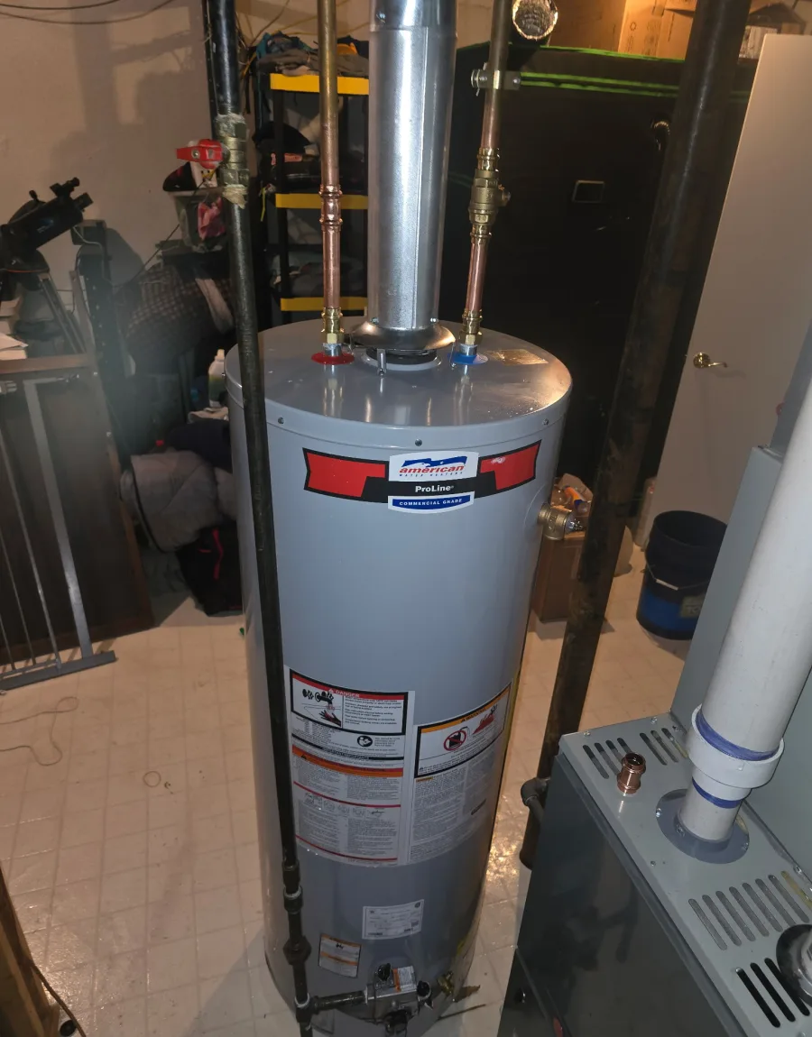 Gas water heater installed and piped in a basement